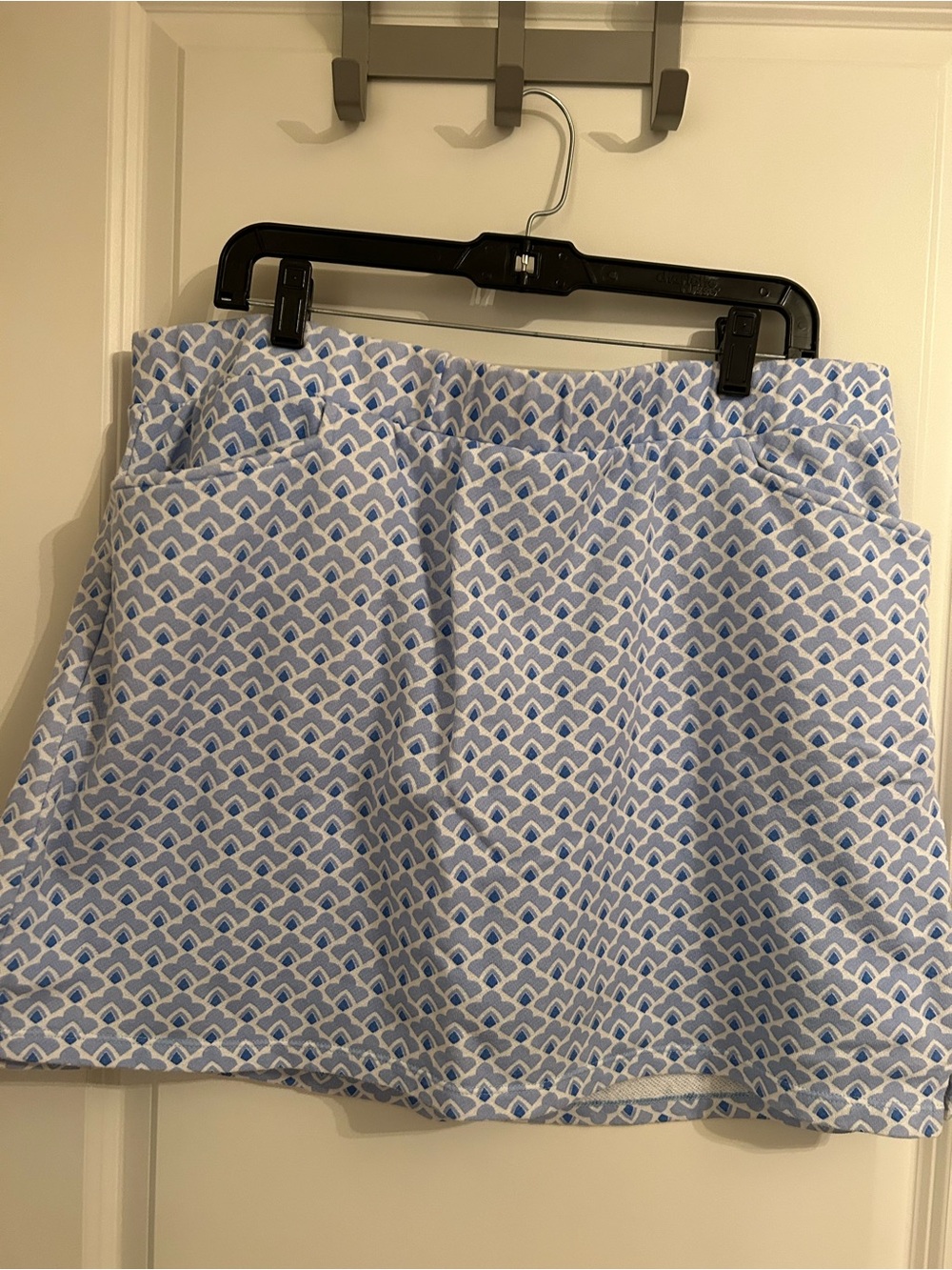 Light Blue Patterned Women’s Golf Skirt with front pockets and shorts under